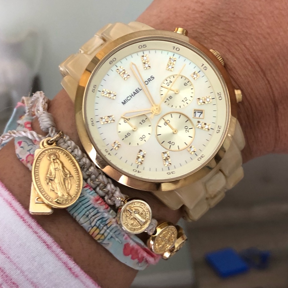 Round gold michael kors chronograph watch